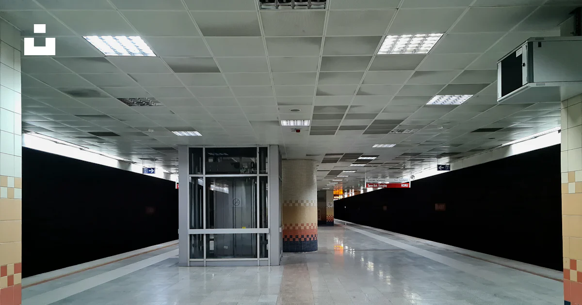 An Empty Parking Garage With No People Inside Photo Free Elevator an-empty-parking-garage-with-no-people-inside-photo-free-elevator