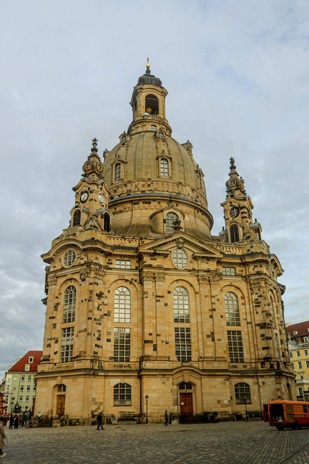 a large building with a clock on the top of it