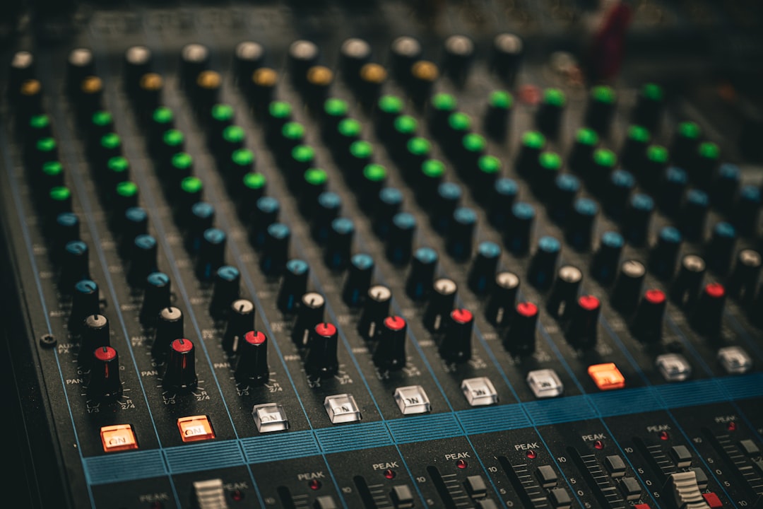 a close up of a sound mixing console, Monitor Station