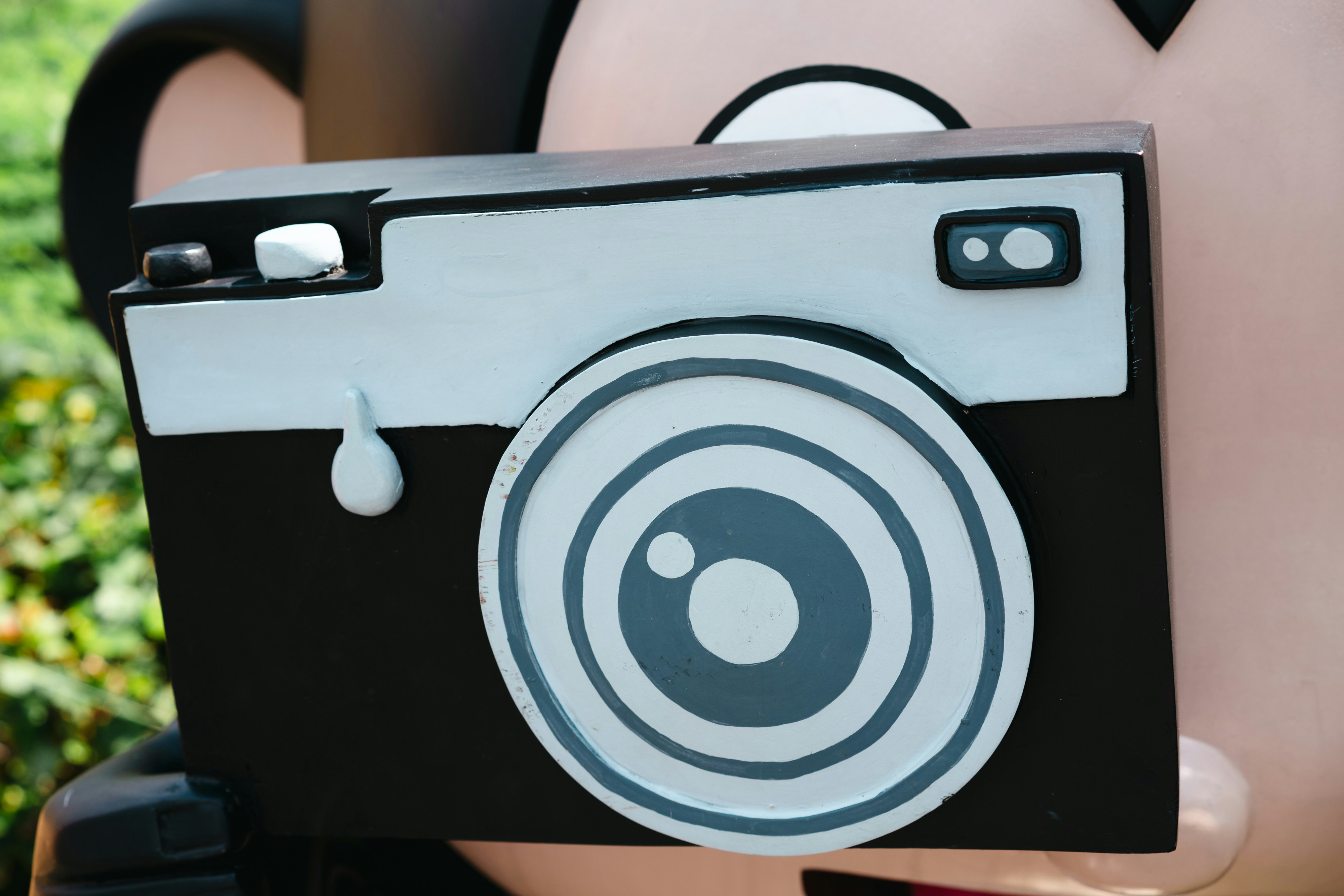 a close up of a person holding a camera, 