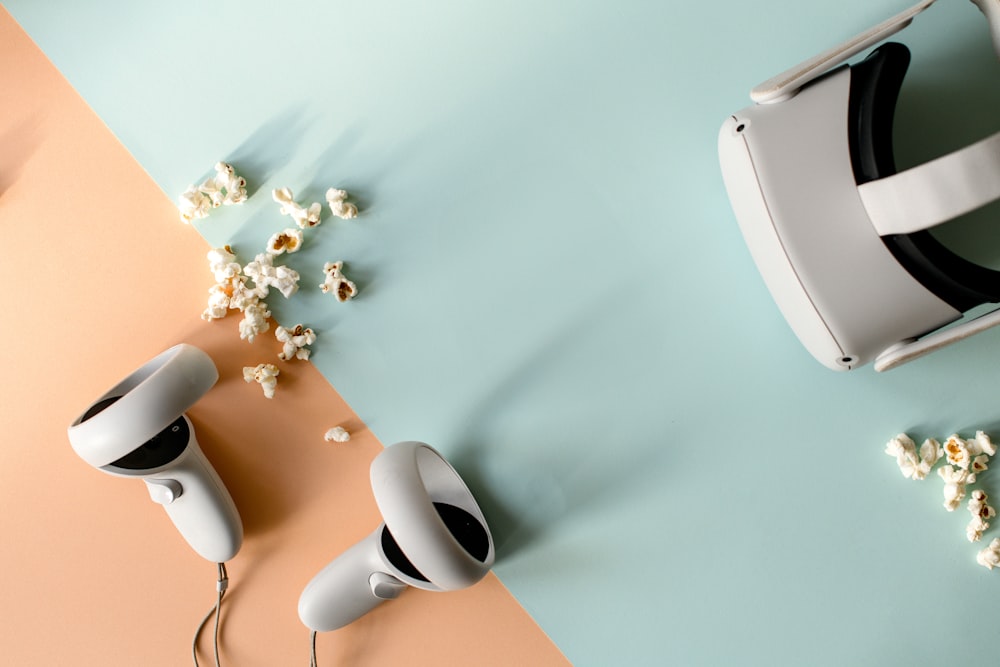 a pair of hair dryers sitting on top of a table