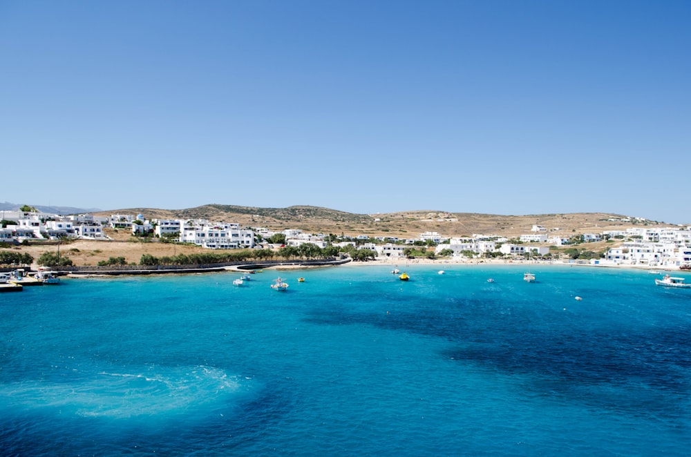 a body of water with boats floating in it