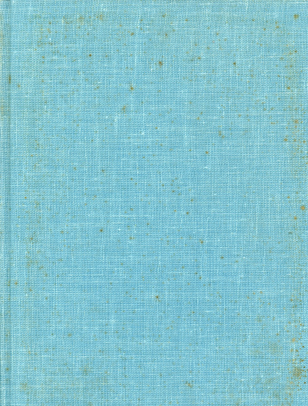 a blue book with gold speckles on it
