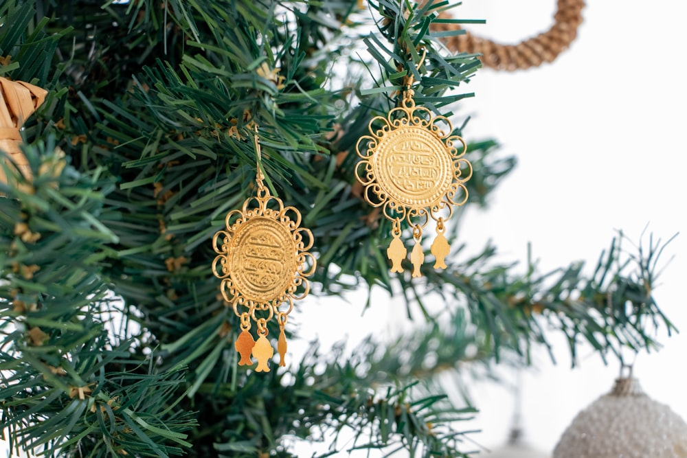 a christmas tree with ornaments hanging from it