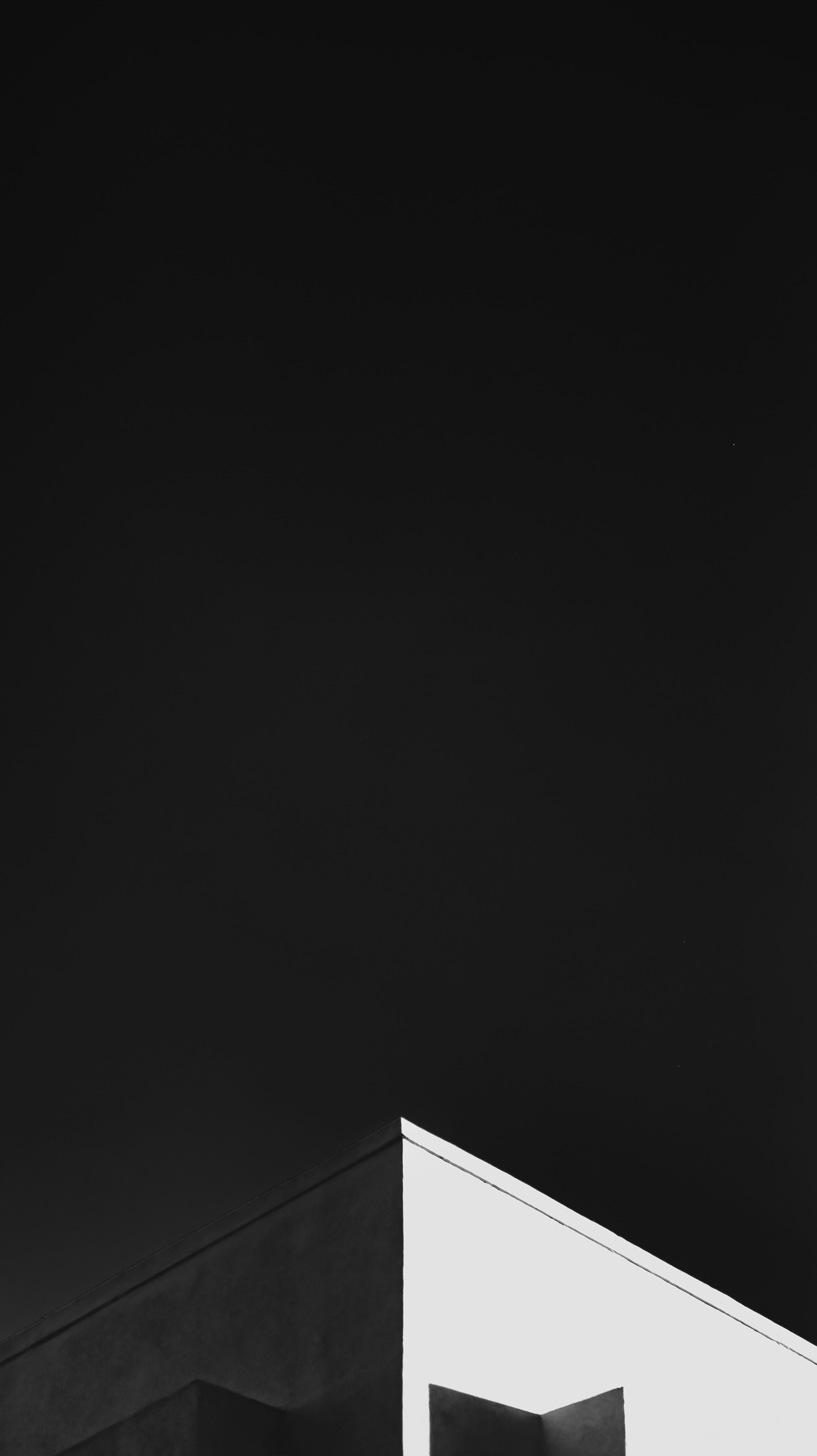 a black and white photo of a clock tower