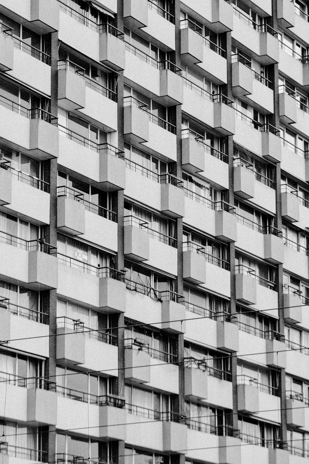 a very tall building with balconies and balconies