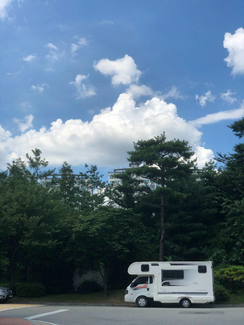 a camper parked on the side of the road