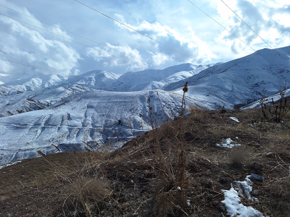 a view of a snow covered mountain range