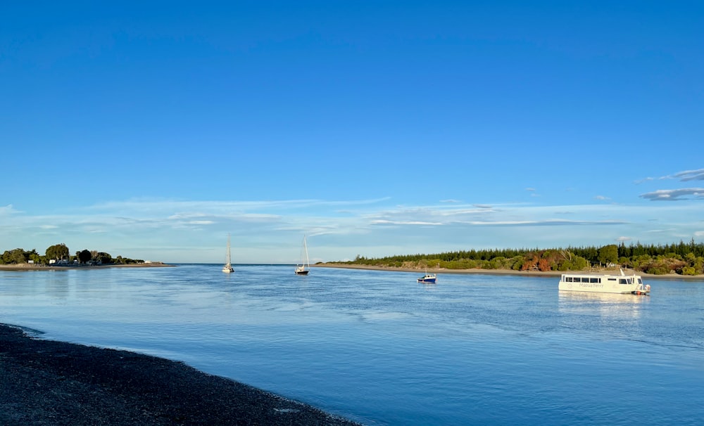 a body of water with boats floating on it