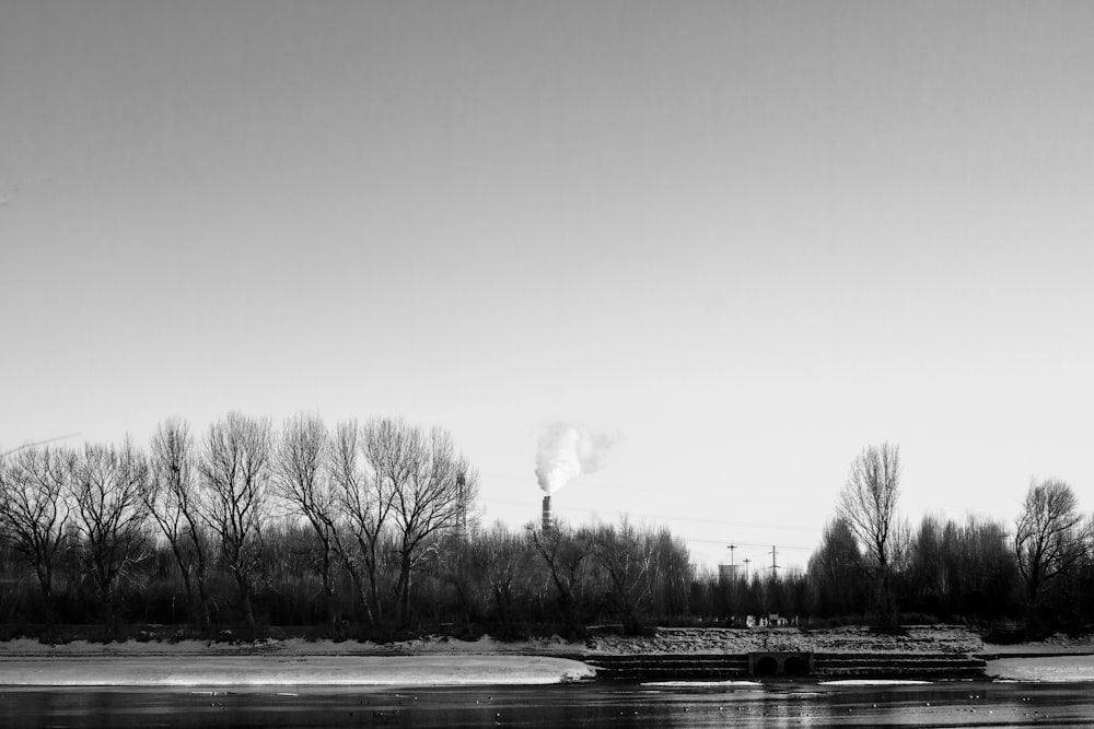 a black and white photo of a boat in the water