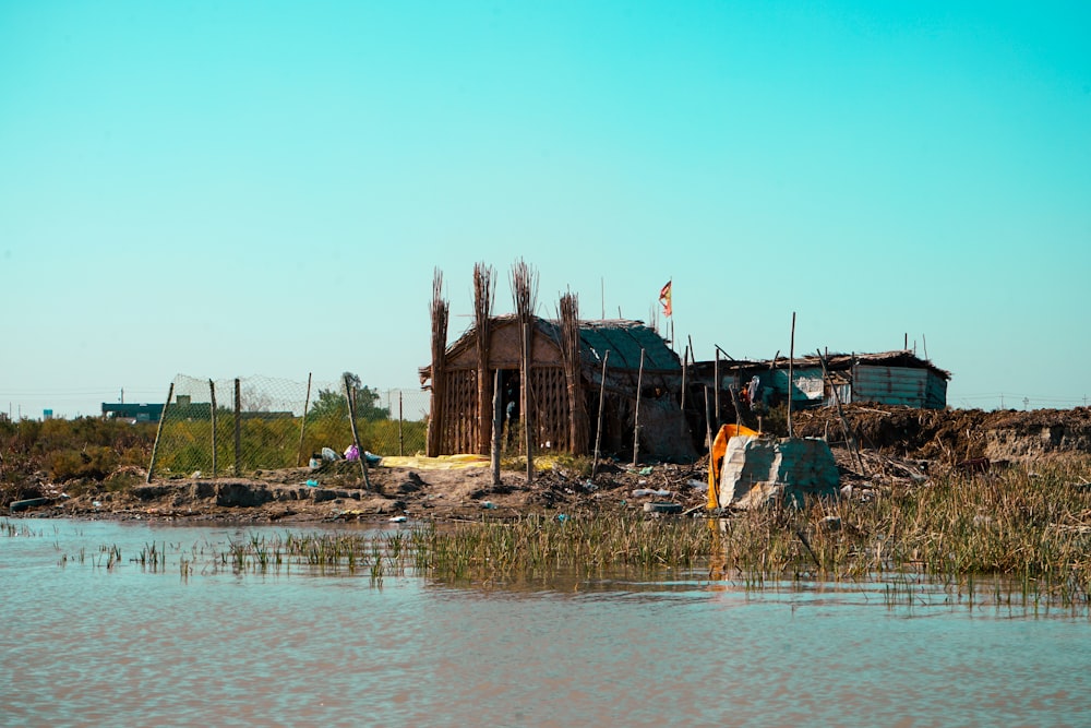 a house on the shore of a body of water