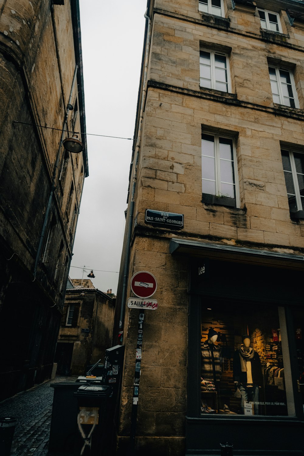 a street sign in front of a building