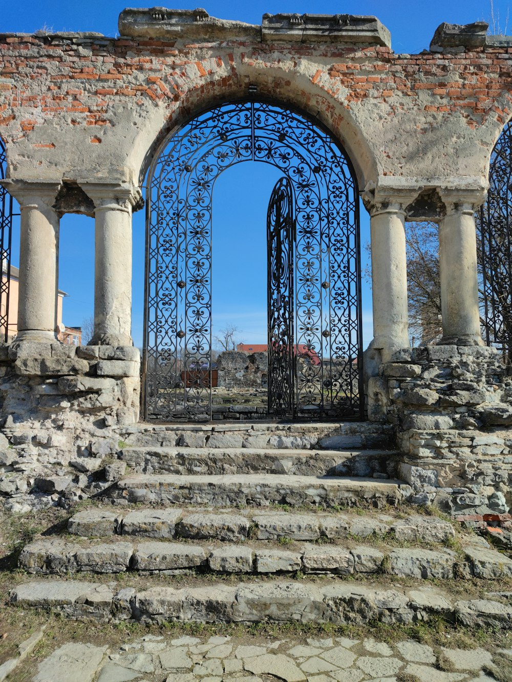 a stone staircase leading to an old building