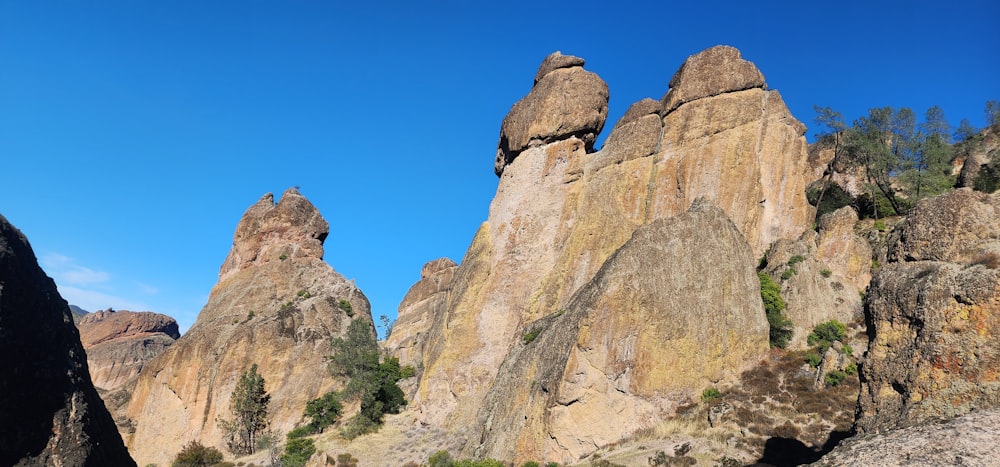 a group of large rocks sitting next to each other