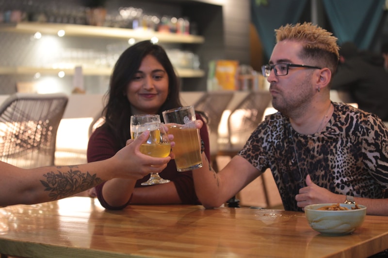 a couple of people that are sitting at a table
