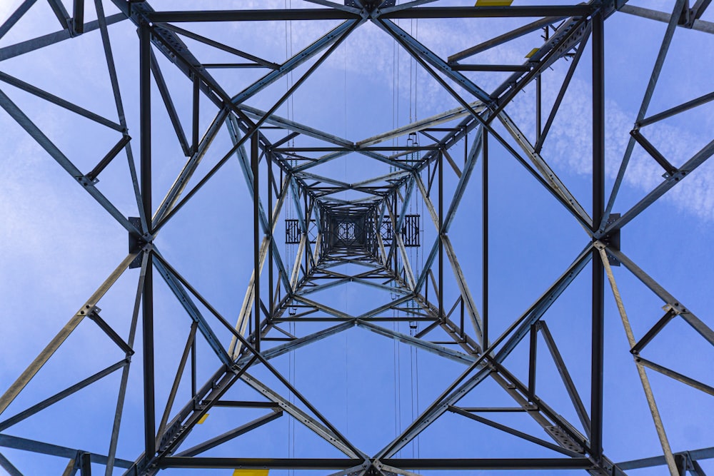 a tall metal structure with a sky in the background