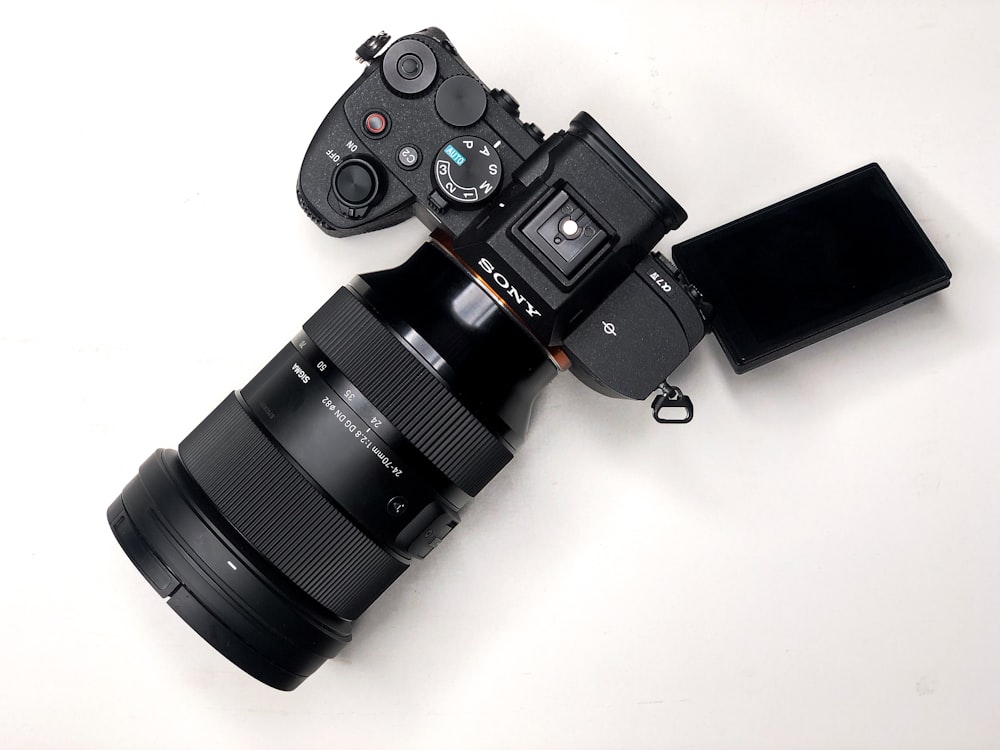 a camera sitting on top of a white table