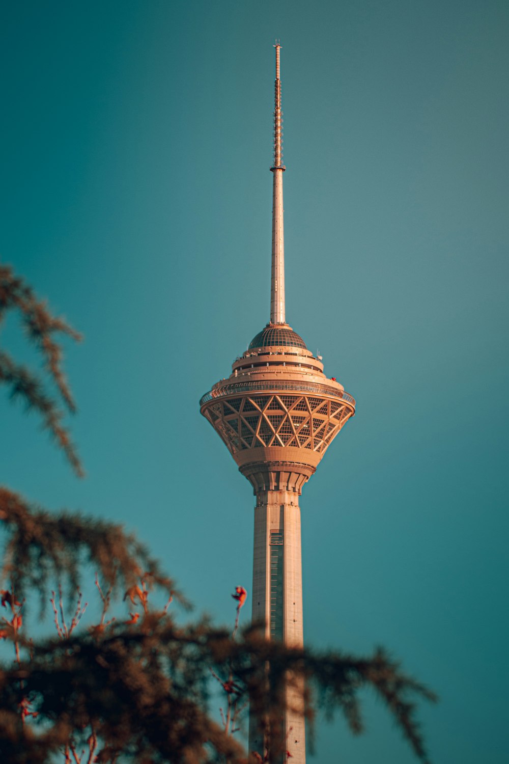 a tall tower with a sky background