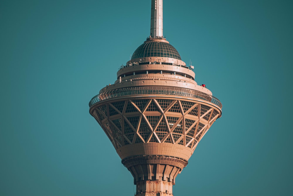 a very tall tower with a sky background