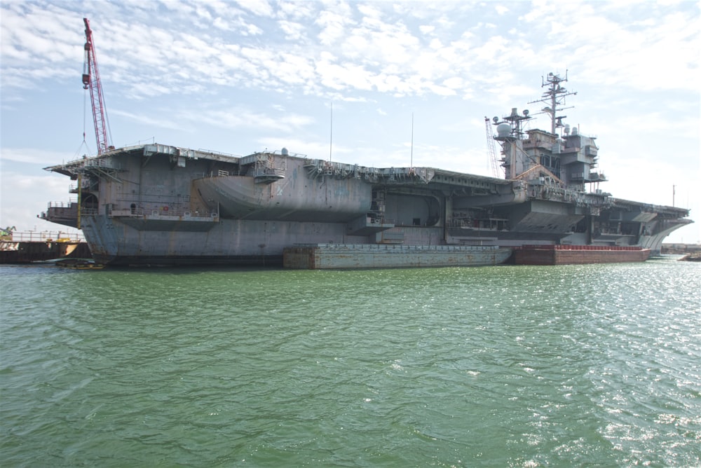 a large ship sitting on top of a body of water