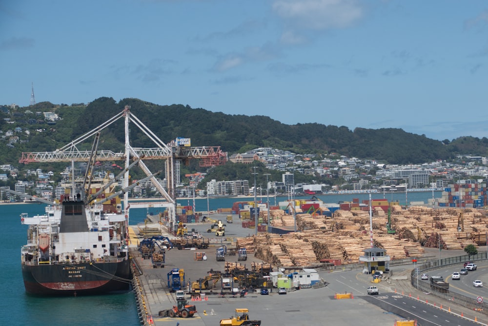 a large cargo ship docked at a dock