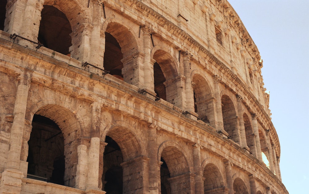 a close up of the side of an ancient building