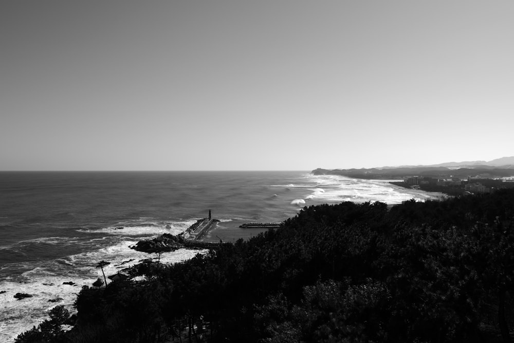 a black and white photo of the ocean