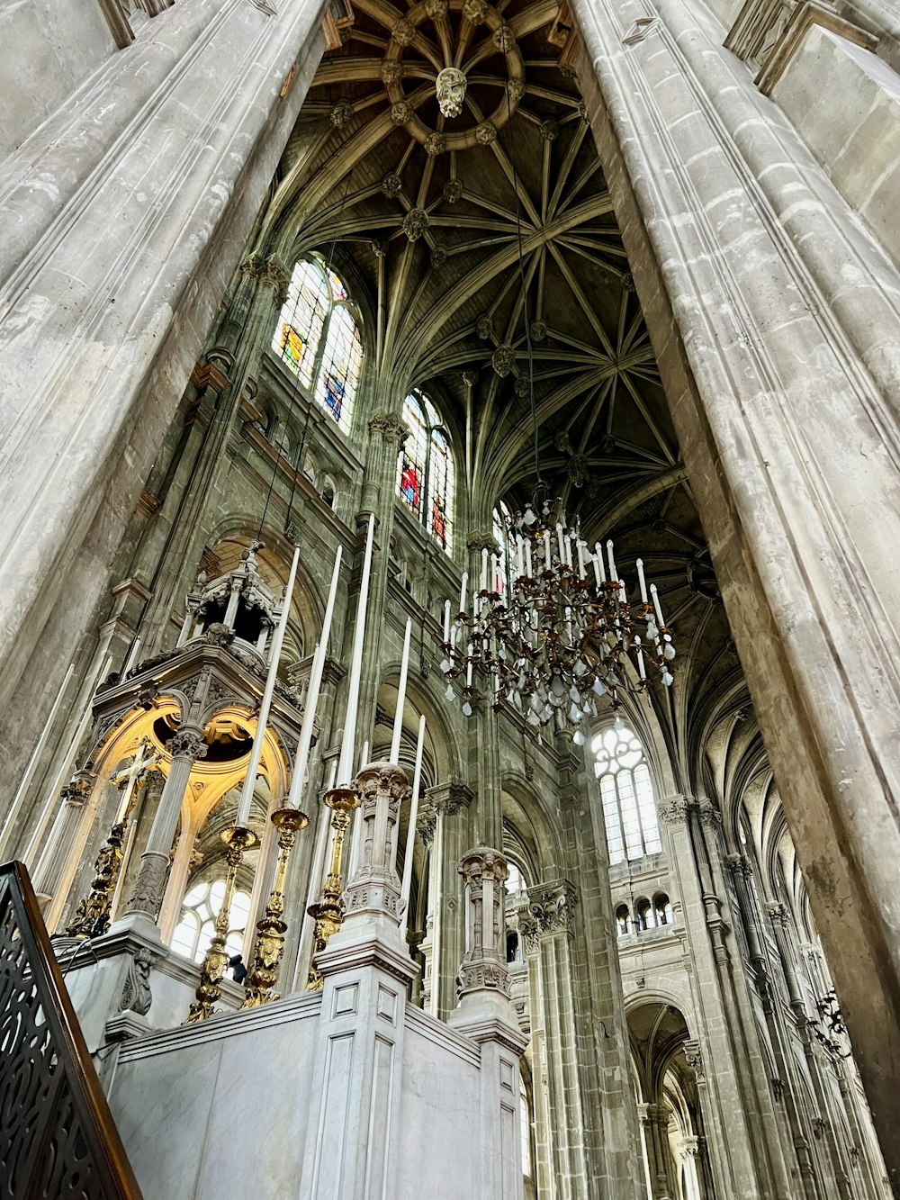 a cathedral with a chandelier hanging from the ceiling