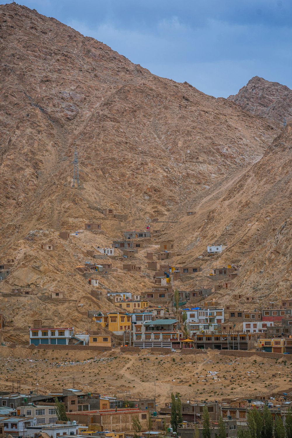 a mountain with a village in the middle of it