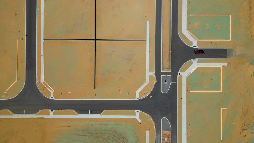 an aerial view of an intersection in a desert