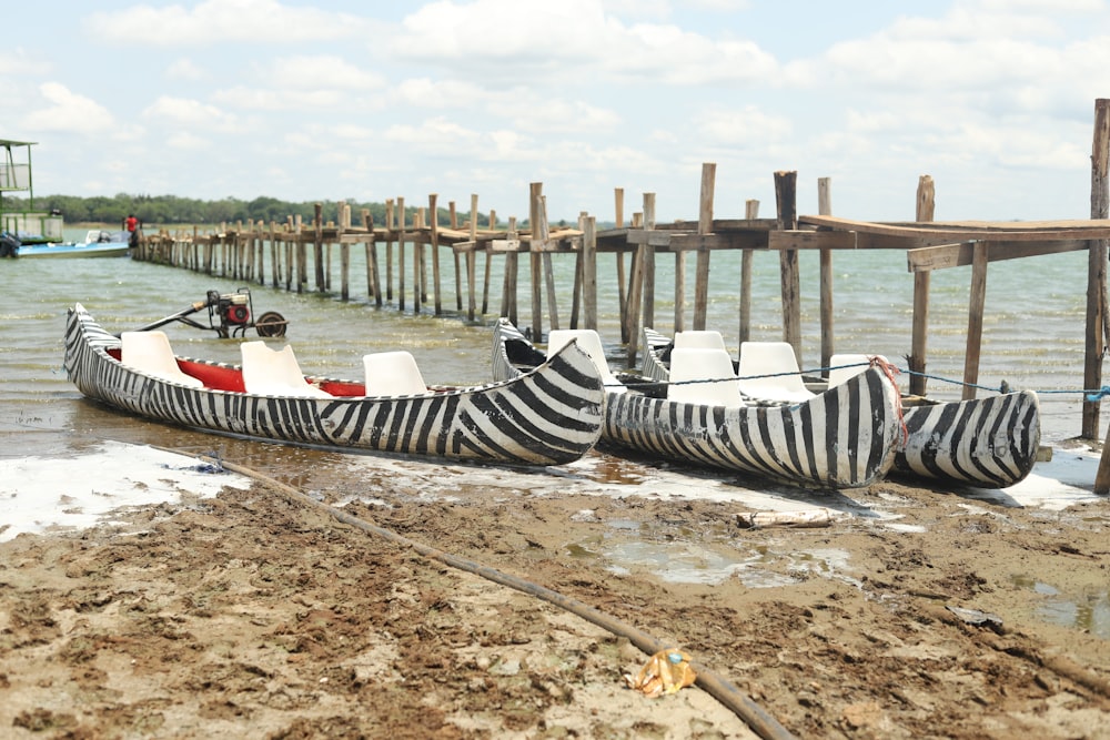 a couple of boats that are sitting in the water