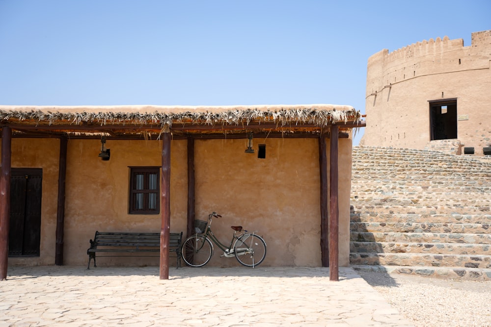 a bike parked in front of a building