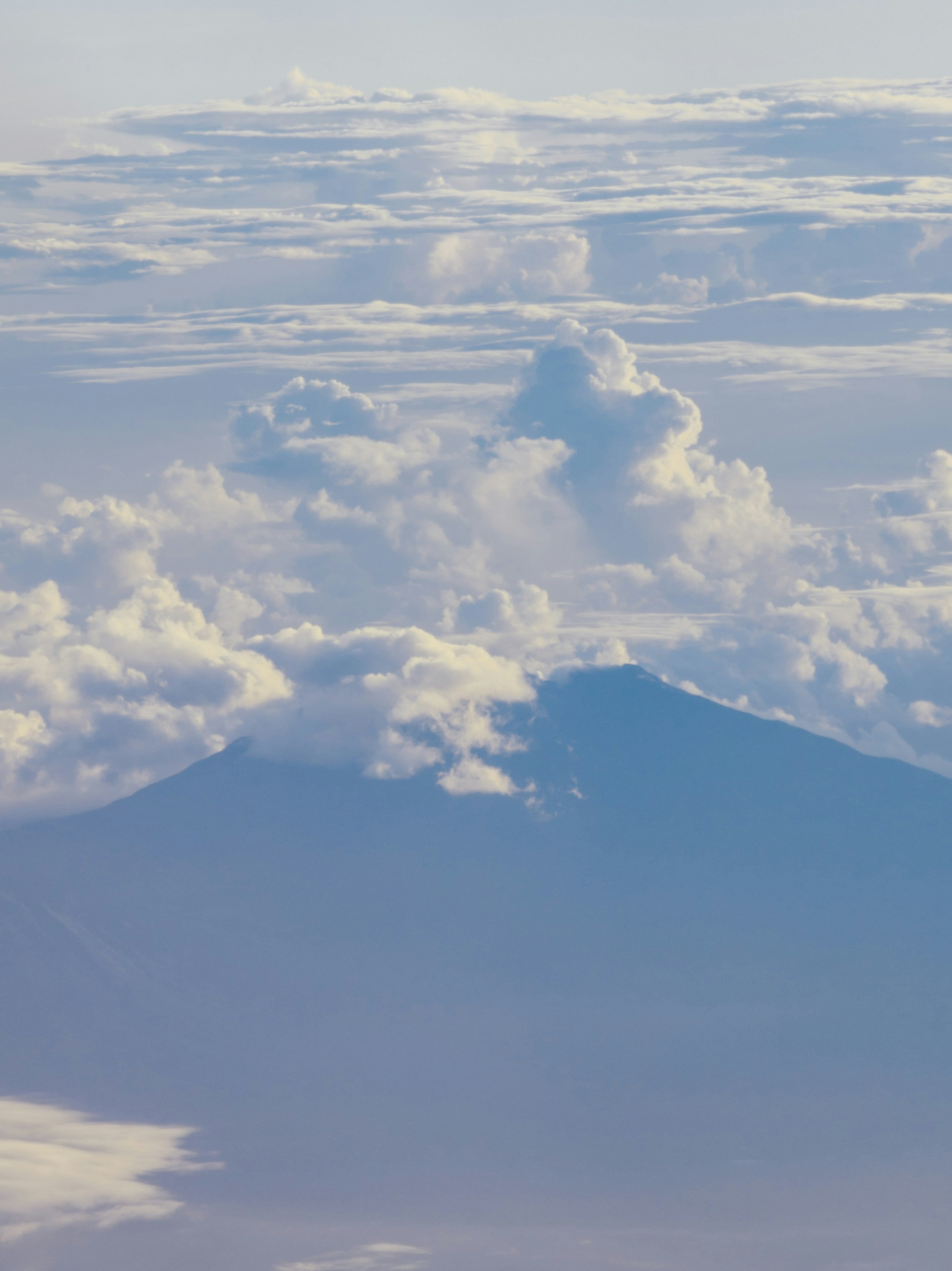 a view of a mountain from an airplane