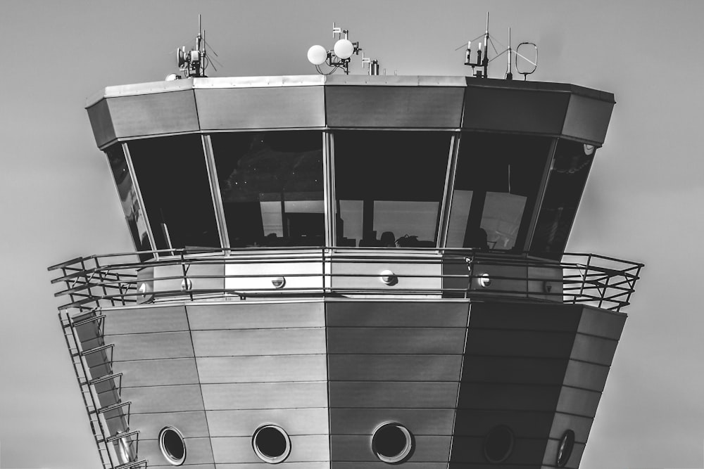 a black and white photo of a control tower