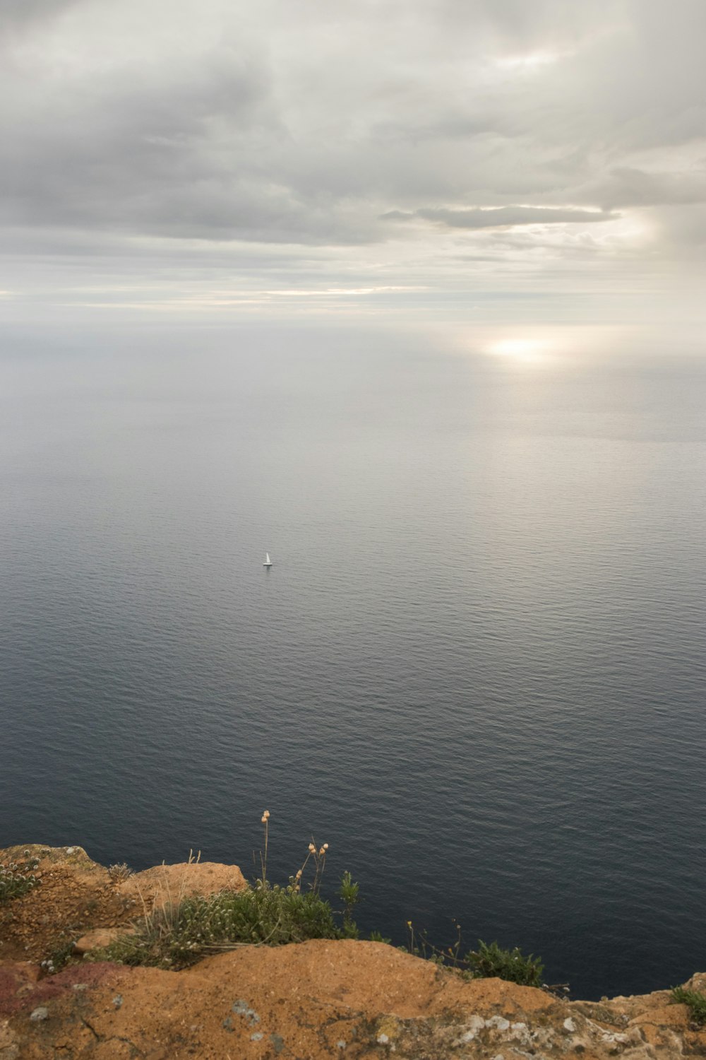 a view of a body of water from a hill