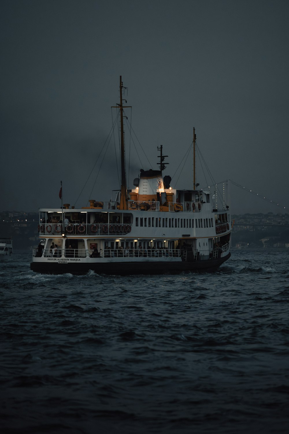 a large boat floating on top of a body of water