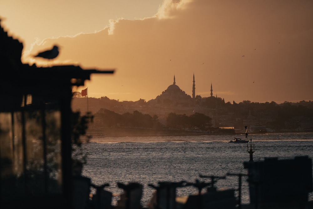 a view of a large body of water with a city in the background