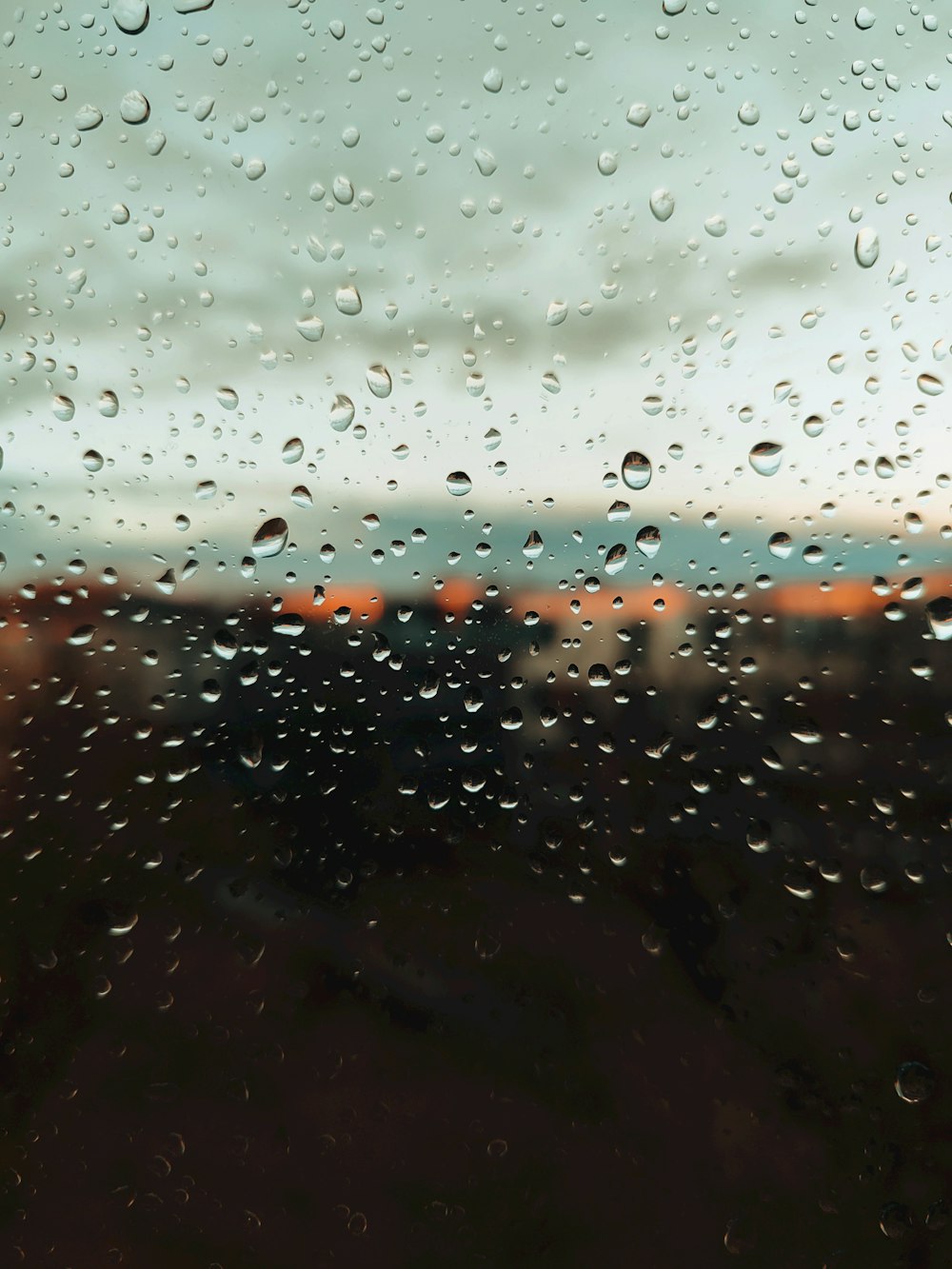 a window with rain drops on it