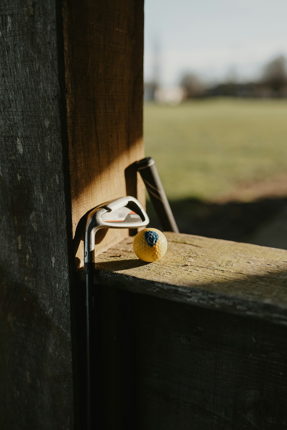 a close up of a handle on a wooden door