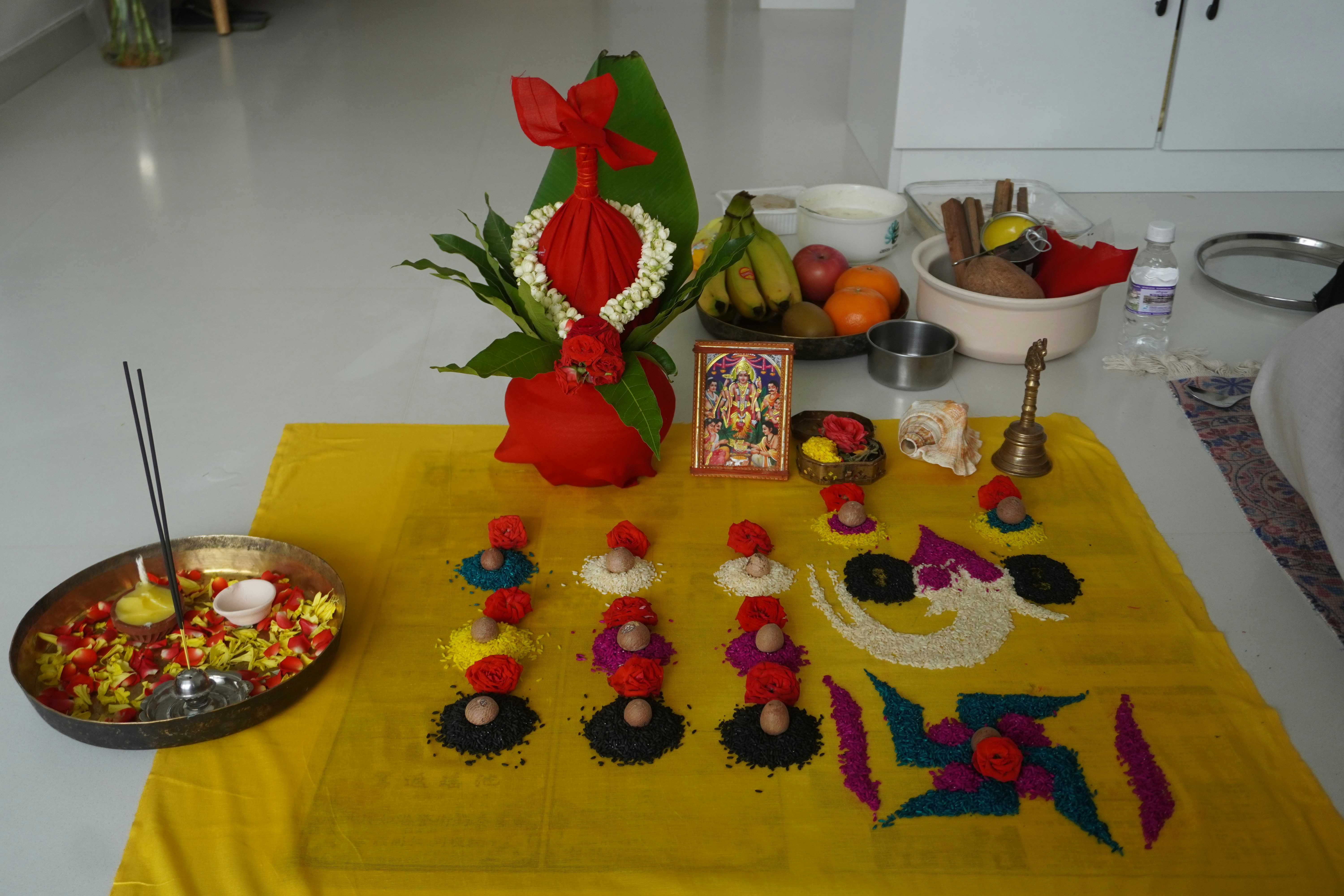Elaborate Navratri puja setup with colorful flowers, brass lamps, and sacred offerings, warm golden candlelight, festive atmosphere