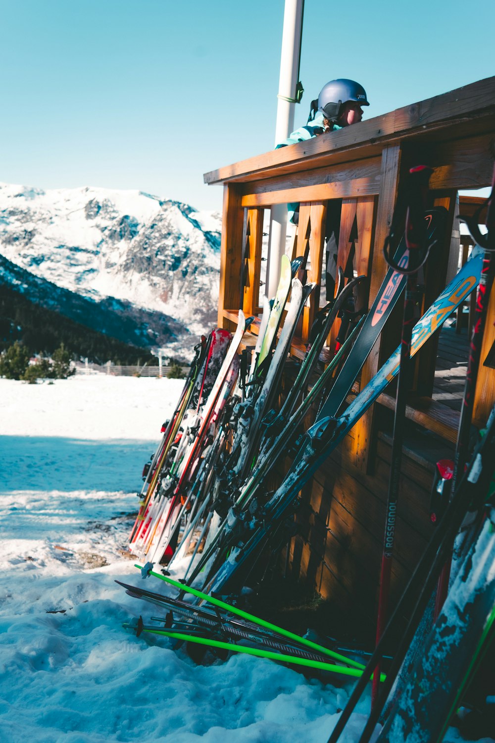 a bunch of skis that are sitting in the snow