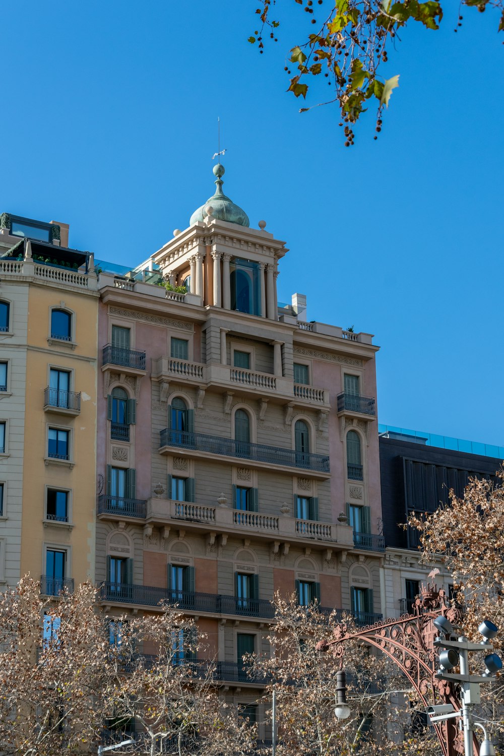 a tall building with a clock on the top of it