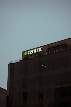 a large building with a sign on top of it