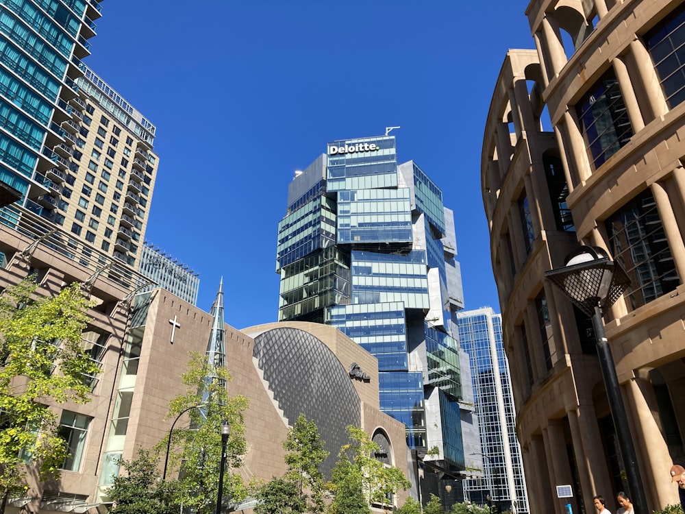 a group of tall buildings sitting next to each other