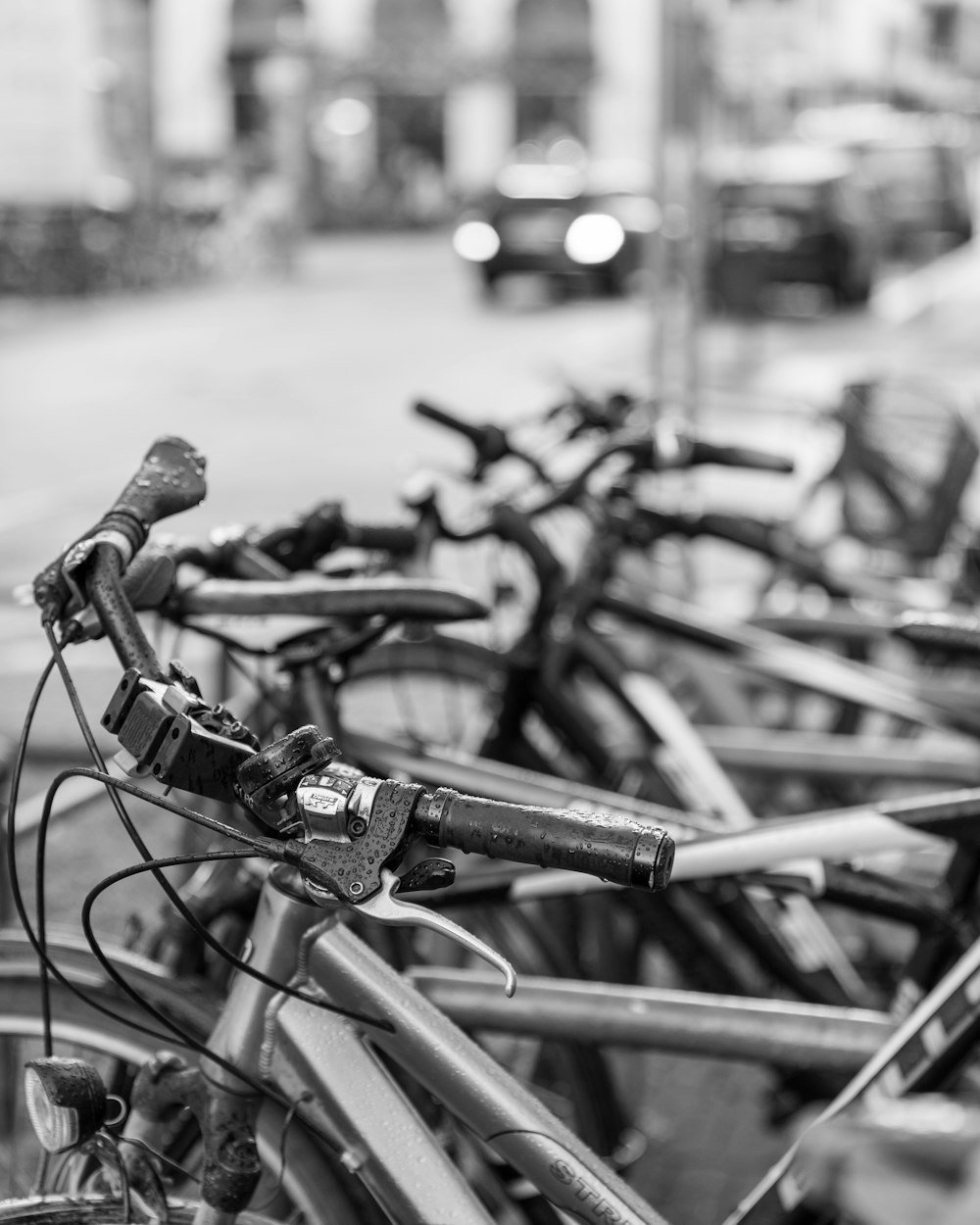 a bunch of bikes parked next to each other