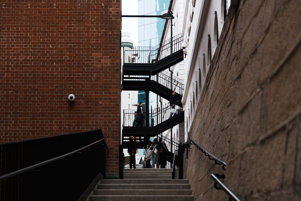 a group of people walking down a set of stairs