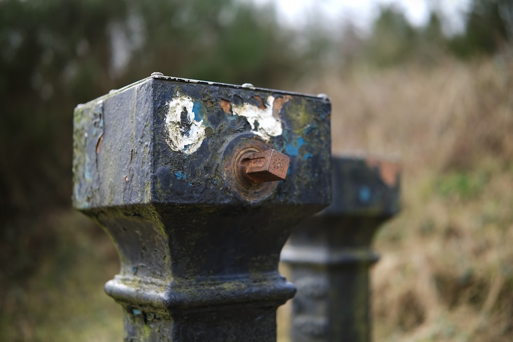 a close up of a rusted fire hydrant