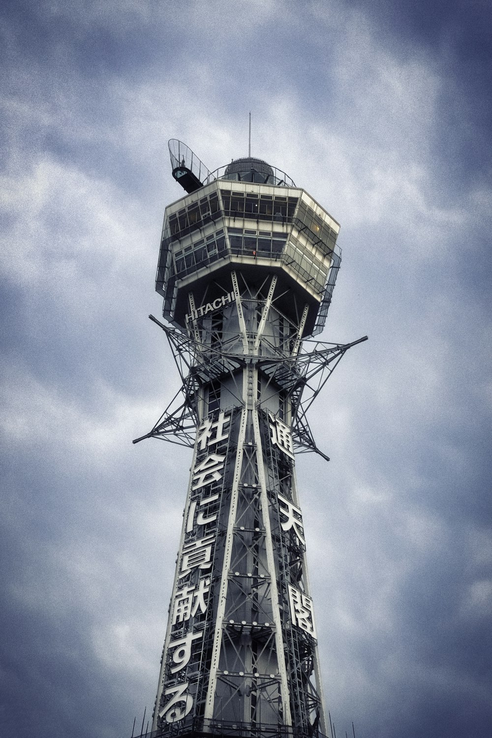 a tall tower with a sky in the background