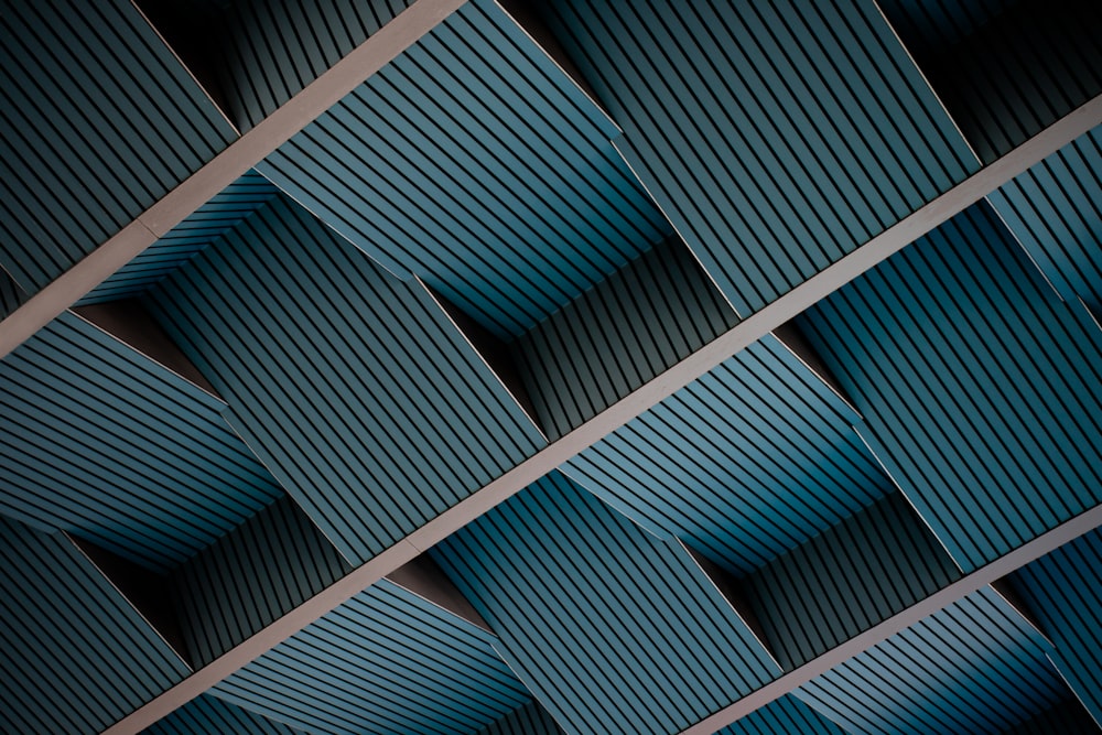 a close up view of a ceiling made of blue corrugated