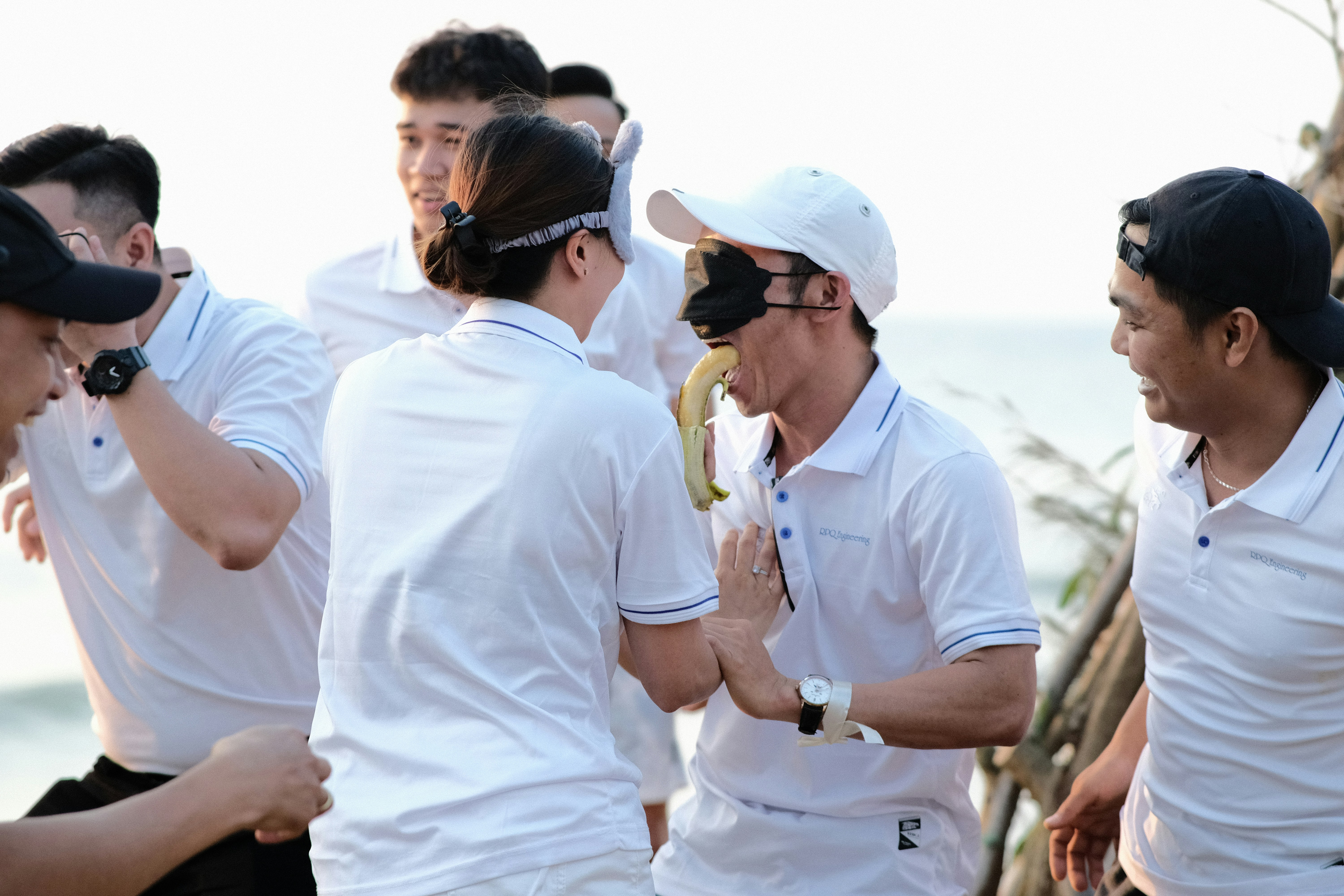 a group of men standing next to each other